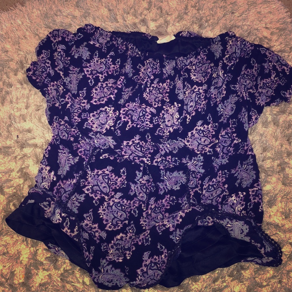 Purple patterned romper size SMALL